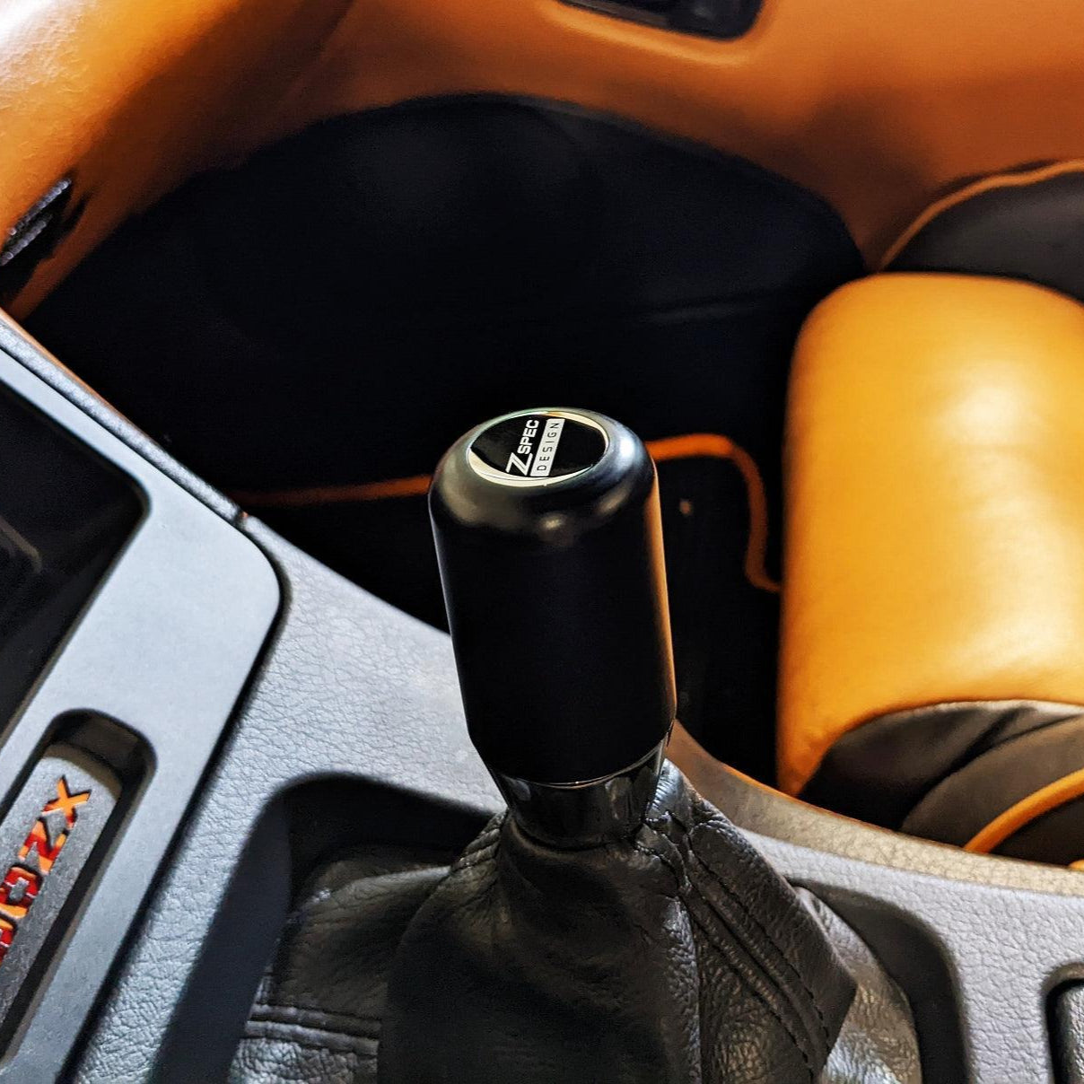 ZSPEC SCENE Shift Knob, M10-1.25, Delrin & Stainless, 6-Speed Shift Pattern Coin Nissan Nismo 350z 370z G35 G37 Q50 Q60 QX Infiniti