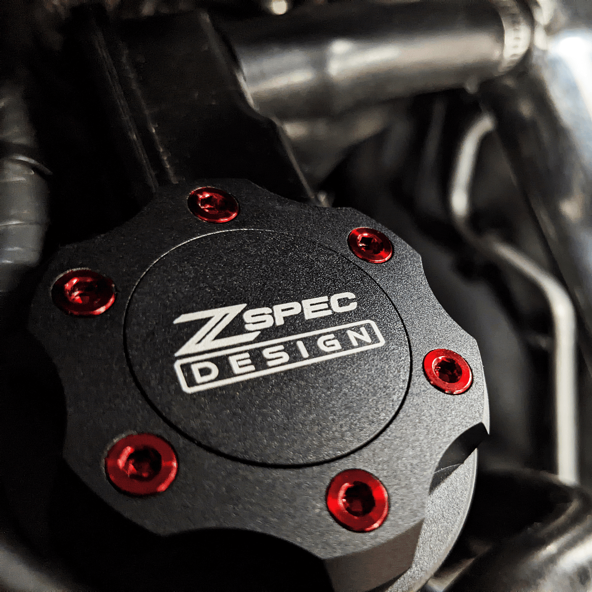 ZSPEC Billet Oil Filler Cap for Nissan/Infiniti/Datsun, Black Cap w/ Titanium Accent - ZSPEC Design LLC - Hardware Fasteners - 2023, 240sx, 240z, 260z, 280z, 280zx, 300z, 300zx, 350z, 370z, 380RS, 400z, accessory, bob sharp, cap, d40, d41, DE & HR, DE & REVUP, FairladyZ, frontier, g35, g37, GT-R, GTR, hakosuka, j30, nismo, nissan, nissanz, nisssan, oil, oil cap, q50, q60, R32, R34, RB20, RB25, RB26, RB30, rogue, RZ34, s30, titan, VQ, vq37, VR, vr30ddtt, z, z31, z32, z33, z34, z34 s2, z34s2 - zspecdesign.com