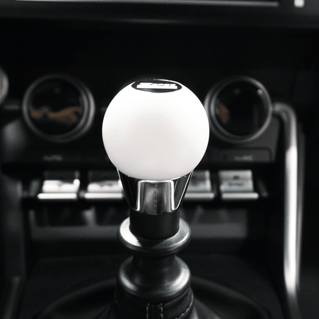 ZSPEC Shift Knob, M12-1.25, Delrin & Stainless, 5-Speed Shift Pattern Coin - ZSPEC Design LLC - Vehicle Parts & Accessories - 3000gt, 323, 626, accessory, brz, DSM, eclipse, EVO, EVO 10, EVO X, frs, genesis, lancer, mazdaspeed, miata, mx3, mx5, mx6, Nismo, Nissan, patrol, probe, protege5, r32, r33, rx-7, rx7, rx8, sentra, Shift Knob - zspecdesign.com