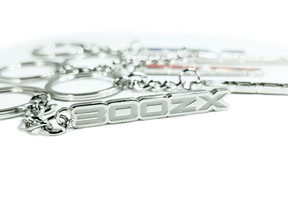 ZSPEC "300zx" Z32 Style keychain - several colors available

Add some style to your key-chain with ZSPEC's accessory for Z lovers. 

Chrome w/ Nissan Z32 300zx Lettering 
Color-filled with Enamel
