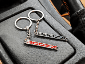 ZSPEC "300zx" Z32 Style keychain - several colors available

Add some style to your key-chain with ZSPEC's accessory for Z lovers. 

Chrome w/ Nissan Z32 300zx Lettering 
Color-filled with Enamel
