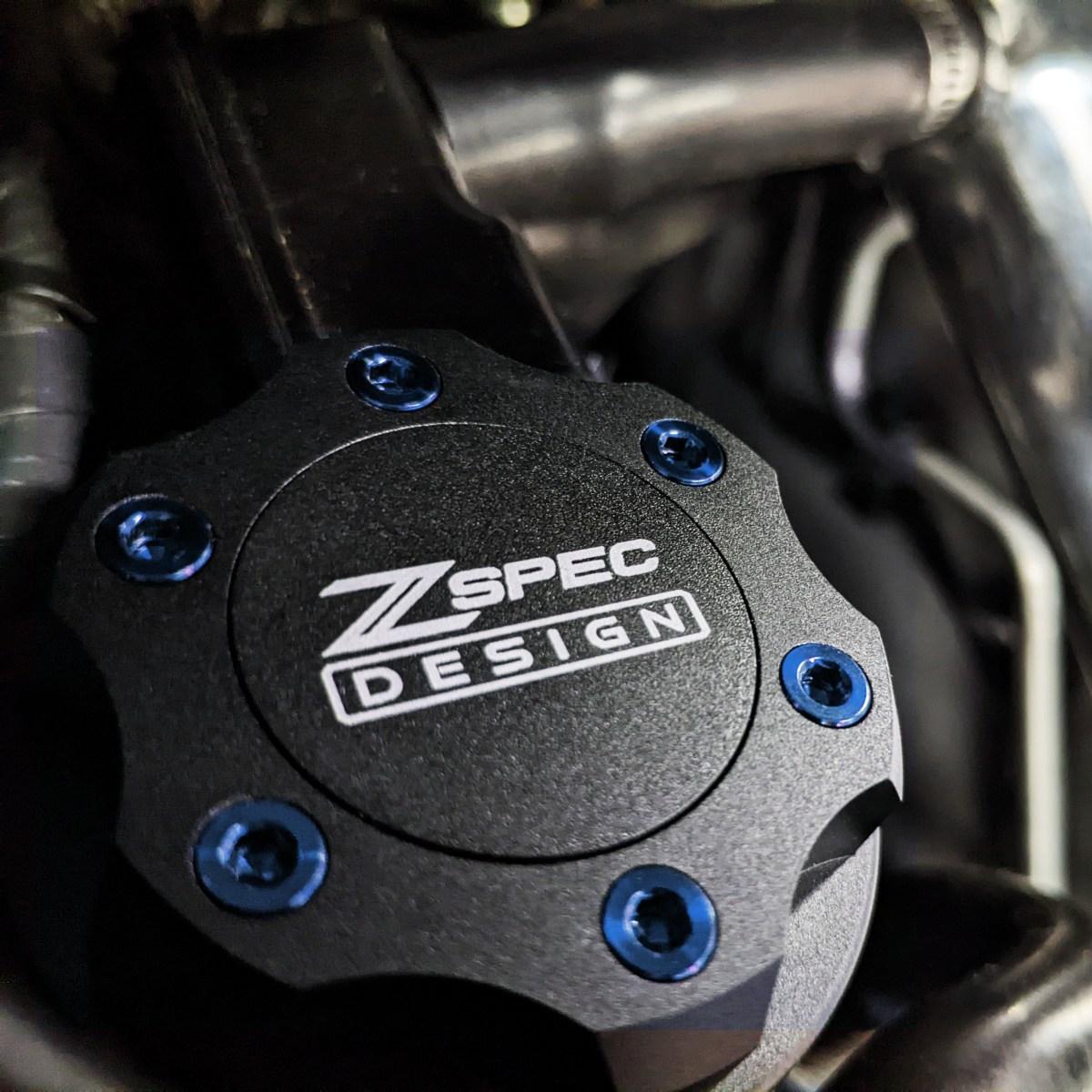 ZSPEC Billet Oil Filler Cap for Nissan/Infiniti/Datsun, Black Cap w/ Titanium Accent - ZSPEC Design LLC - Hardware Fasteners - 2023, 240sx, 240z, 260z, 280z, 280zx, 300z, 300zx, 350z, 370z, 380RS, 400z, accessory, bob sharp, cap, d40, d41, DE & HR, DE & REVUP, FairladyZ, frontier, g35, g37, GT-R, GTR, hakosuka, j30, nismo, nissan, nissanz, nisssan, oil, oil cap, q50, q60, R32, R34, RB20, RB25, RB26, RB30, rogue, RZ34, s30, titan, VQ, vq37, VR, vr30ddtt, z, z31, z32, z33, z34, z34 s2, z34s2 - zspecdesign.com