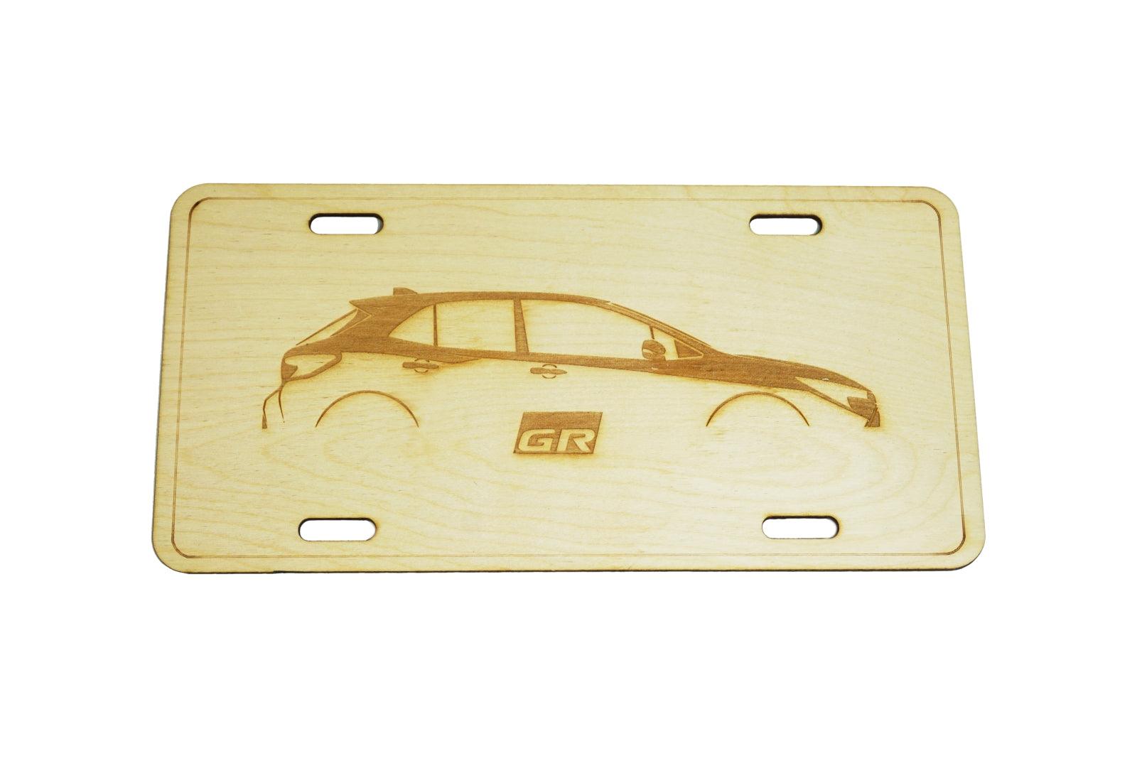 ZSPEC Toyota Corolla GR Sports Compact Hatch-Back Car License Plate, Birch, Ornamental  1/8' Birch Plywood construction.  Same size as a traditional license plate ZSPEC Design LLC Toyota Landcruiser