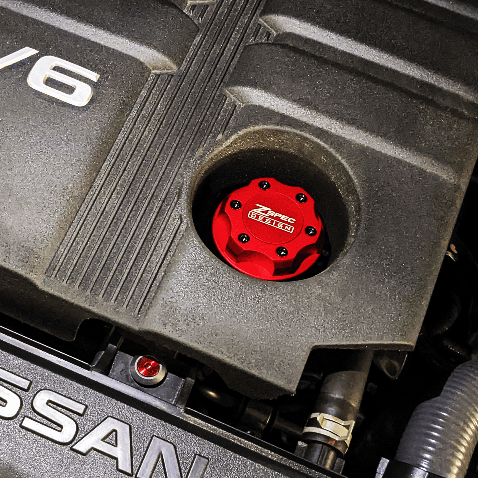 ZSPEC Billet Oil Filler Cap for Nissan/Infiniti/Datsun, Red Cap w/ Titanium Accents - ZSPEC Design LLC - Hardware Fasteners - 2023, 240sx, 240z, 260z, 280z, 280zx, 300z, 300zx, 350z, 370z, 380RS, 400z, accessory, bob sharp, cap, d40, d41, DE & HR, DE & REVUP, FairladyZ, frontier, g35, g37, GT-R, GTR, hakosuka, j30, nismo, nissan, nissanz, nisssan, oil, oil cap, q50, q60, R32, R34, RB20, RB25, RB26, RB30, rogue, RZ34, s30, titan, VQ, vq37, VR, vr30ddtt, z, z31, z32, z33, z34, z34 s2, z34s2 - zspecdesign.com